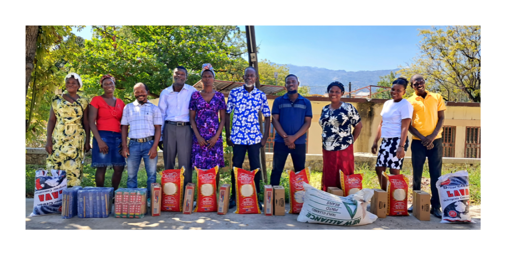 Haitian people receiving food packs