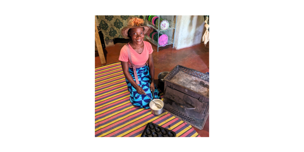 Cecilia, a mother, sits and prepares scones to sell