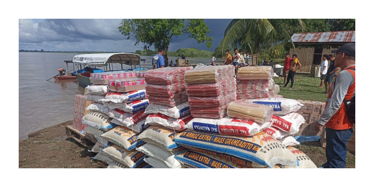 stacks of bags of grain and other supplies