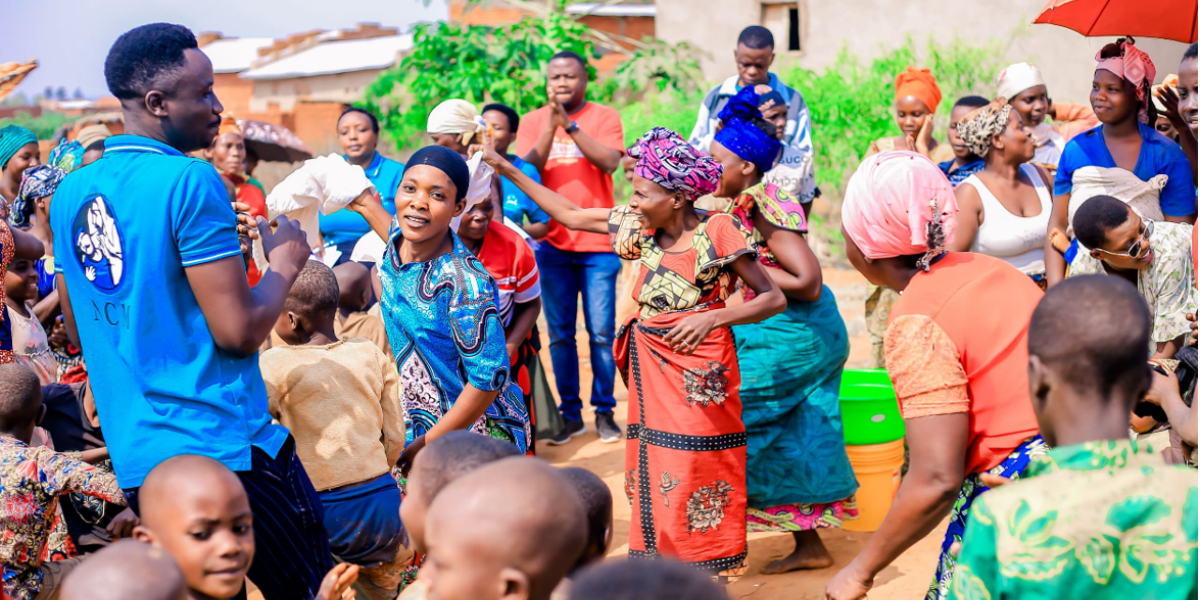 Refugee families at a gathering to distribute aid
