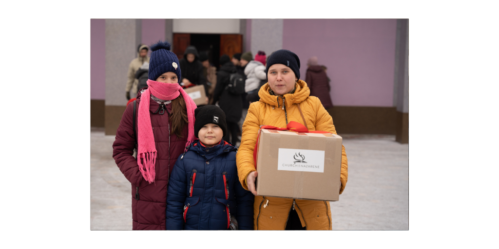 Family receiving donations in Vapniarka