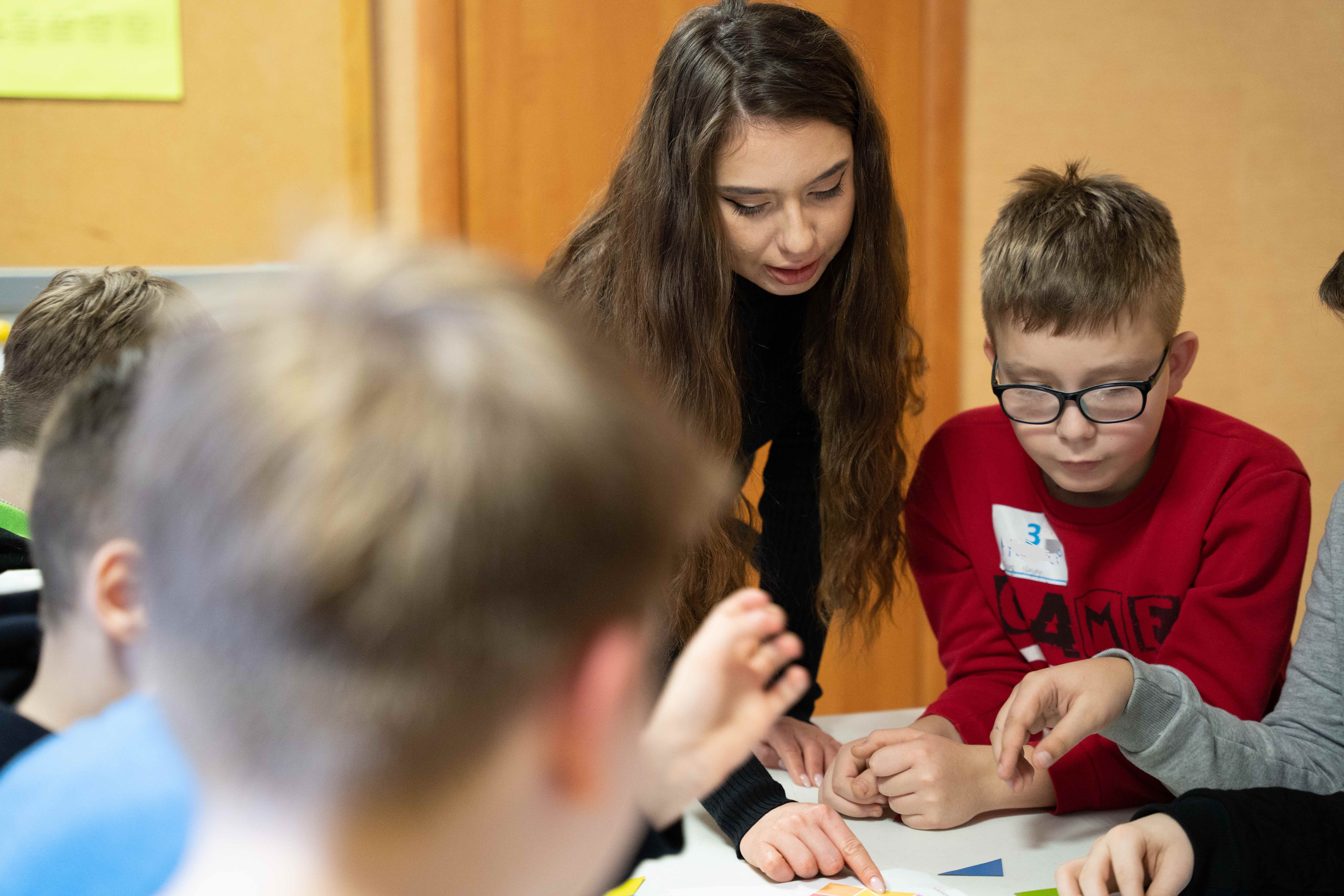 teacher and child at kids camp