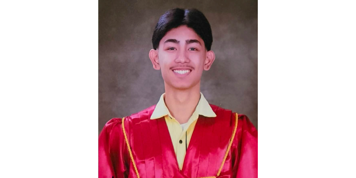 David in his graduation regalia