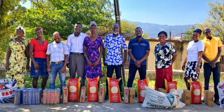 People receiving food packs in Haiti