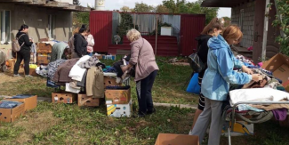 People sort through clothing donations in Ukraine